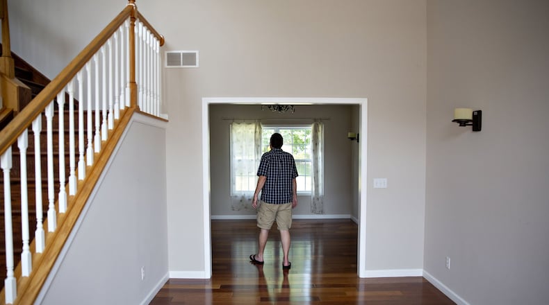 Home prices are still rising, but demand for houses in Atlanta has moderated. (Bloomberg photo by Daniel Acker)