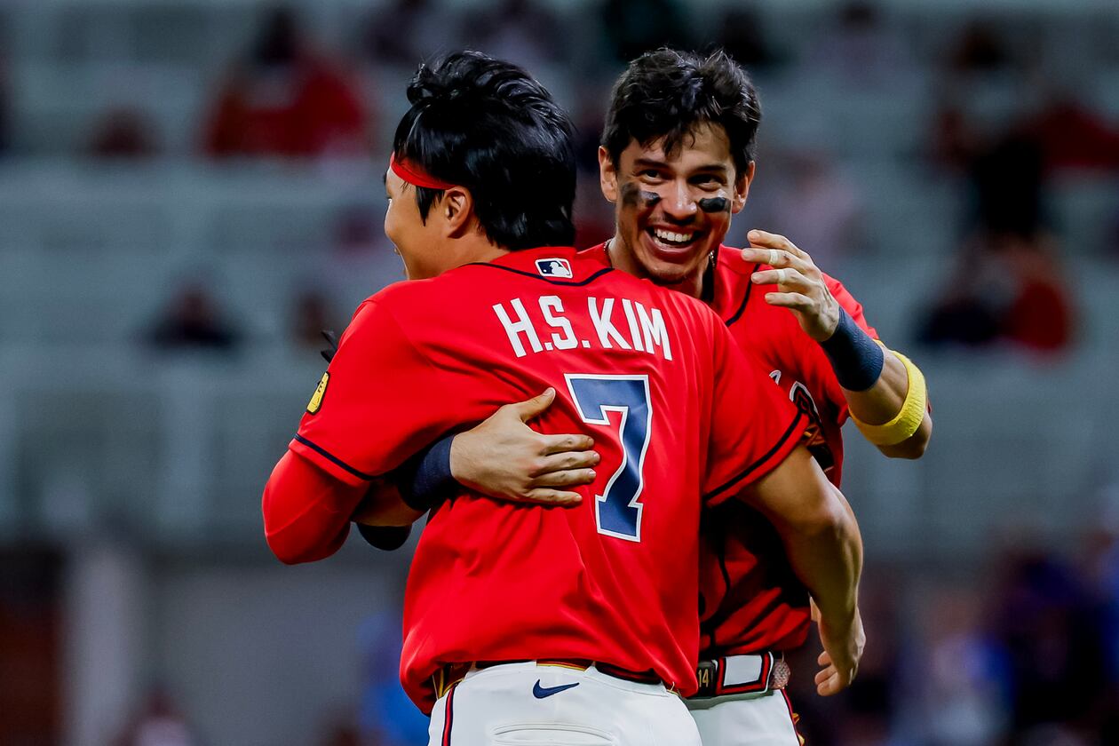 Atlanta Braves Ha-Seong Kim (7) celebrates with Mauricio Dubón after Kim scored the game-winning run against the Philadelphia Phillies during the 11th inning of a baseball game, Friday, Sept. 11, 2026, in Atlanta. (Erik S. Lesser/AP)