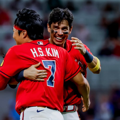Atlanta Braves Ha-Seong Kim (7) celebrates with Mauricio Dubón after Kim scored the game-winning run against the Philadelphia Phillies during the 11th inning of a baseball game, Friday, Sept. 11, 2026, in Atlanta. (Erik S. Lesser/AP)
