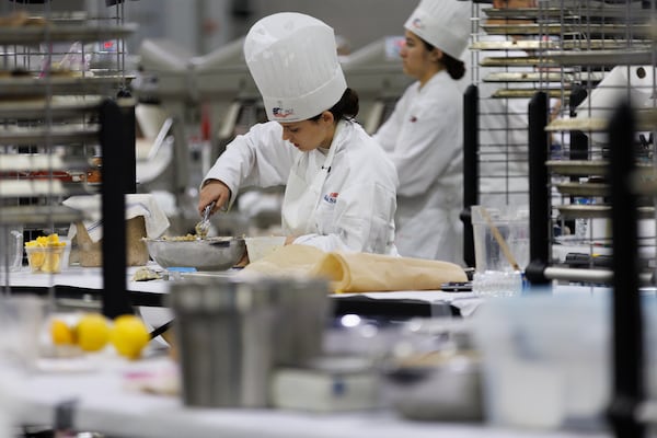 During the culinary arts competition at the SkillsUSA National Leadership and Skills Conference, competitors demonstrate knife skills, sanitation and teamwork at the Georgia World Congress Center in Atlanta, Thursday, June 4, 2026. (Estela Muñoz/AJC)