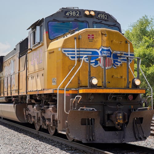 FILE - A Union Pacific train travels through Union, Neb., July 31, 2018. (AP Photo/Nati Harnik, File)