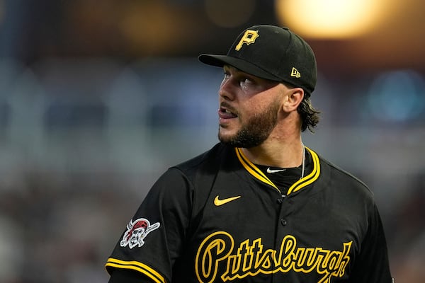 Pittsburgh Pirates starting pitcher Paul Skenes (30) walks back to the dugout after the bottom of the fifth inning of a baseball game against the Minnesota Twins Friday, July 11, 2025, in Minneapolis. (AP Photo/Abbie Parr)