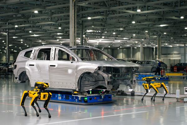 Boston Dynamic robots inspect welds during the assembly of a IONIQ 5 electric vehicle at the Hyundai Metaplant in Bryan County in March 2025.  (Justin Taylor/The Current GA)