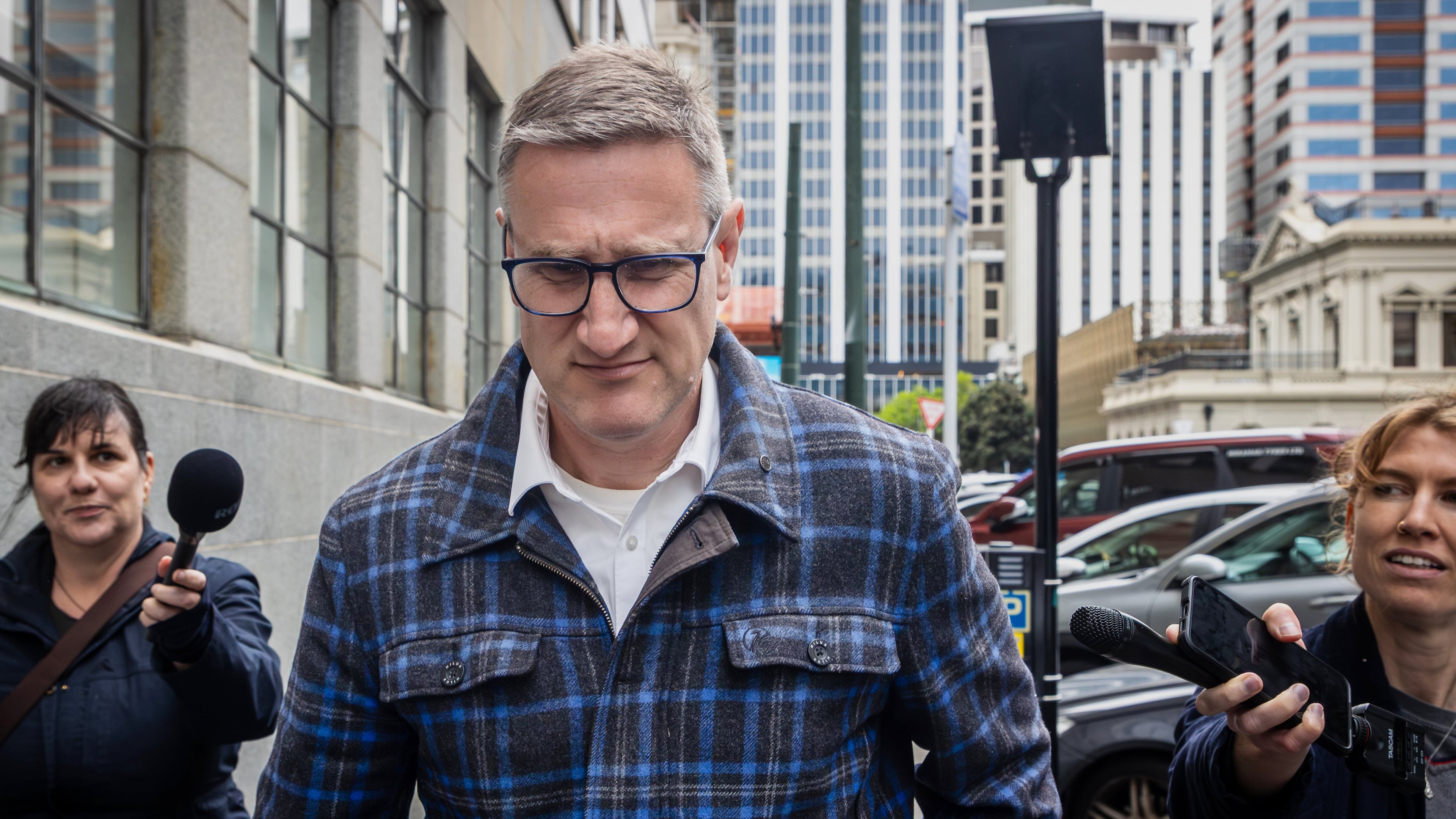 FILE - Former deputy police commissioner, Jevon McSkimming, walks from the High Court in Wellington, New Zealand, on Nov. 6, 2025. (Bruce MacKay/The Post via AP, File)