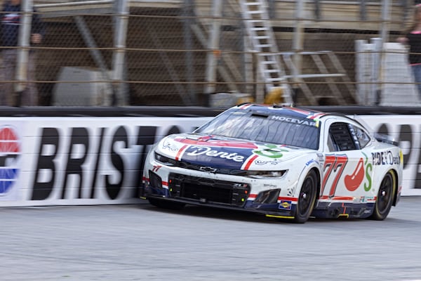 Carson Hocevar (77) goes down the back stretch during a NASCAR Cup Series auto race, Sunday, April 13, 2025, in Bristol, Tenn. (AP Photo/Wade Payne)