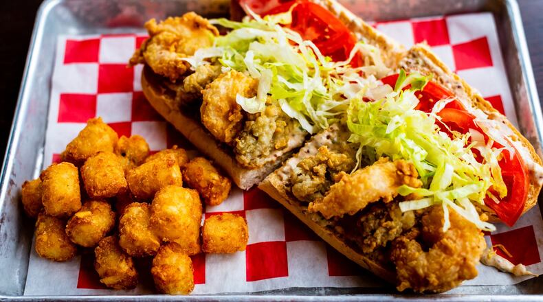 The “Shoyster” po’boy at Lagarde American Eatery gives you a mix of fried oysters and fried shrimp. CONTRIBUTED BY HENRI HOLLIS