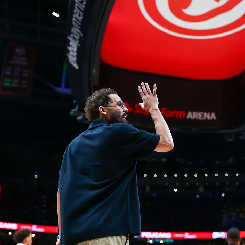 Trae Young waves to the crowd near the end of Wednesday's game against the Pelicans. Young is now a Washington Wizard, having been traded this week. (Colin Hubbard/AP)