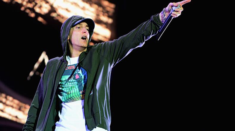 Eminem, shown performing at Lollapalooza in August, will headline the Saturday night of Music Midtown 2014 at Piedmont Park. Also on the bill: Zac Brown Band, John Mayer, Jack White, Iggy Azalea, Lorde and dozens more. Getty Images.