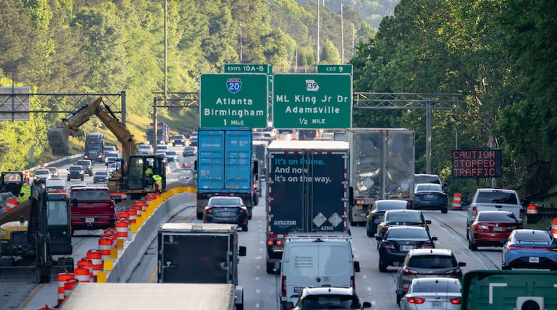 A section of I-285 will be shutdown Mother’s Day weekend. Construction vehicles were in the area during rush hour near the Cascade Road exit on Tuesday, May 5, 2026. (Ben Hendren for the AJC)