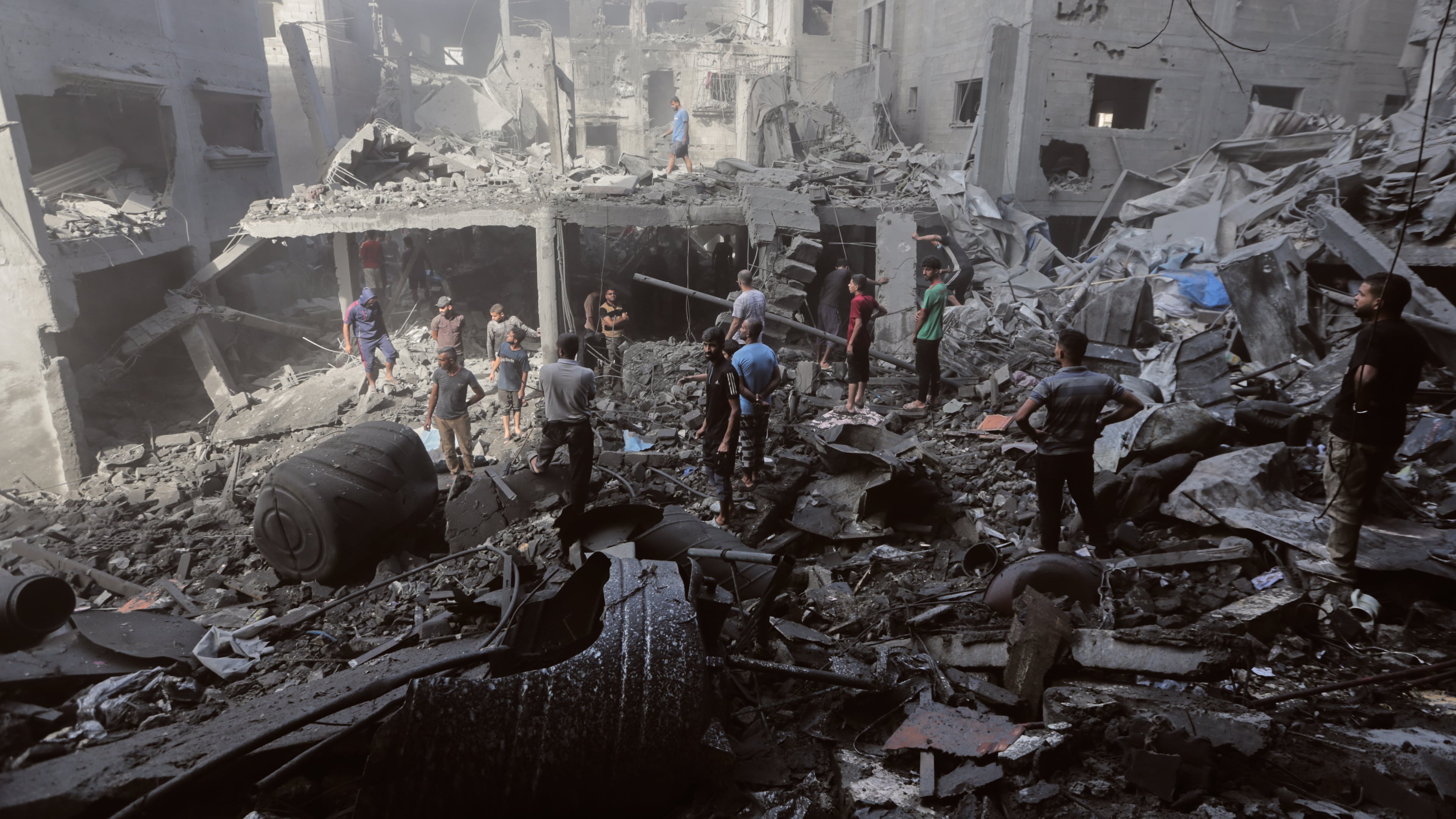Palestinians inspect the rubble of a building, destroyed by an Israeli army strike at Al-Shati camp in Gaza City Wednesday, Oct. 29, 2025. (AP Photo/Yousef Al Zanoun)