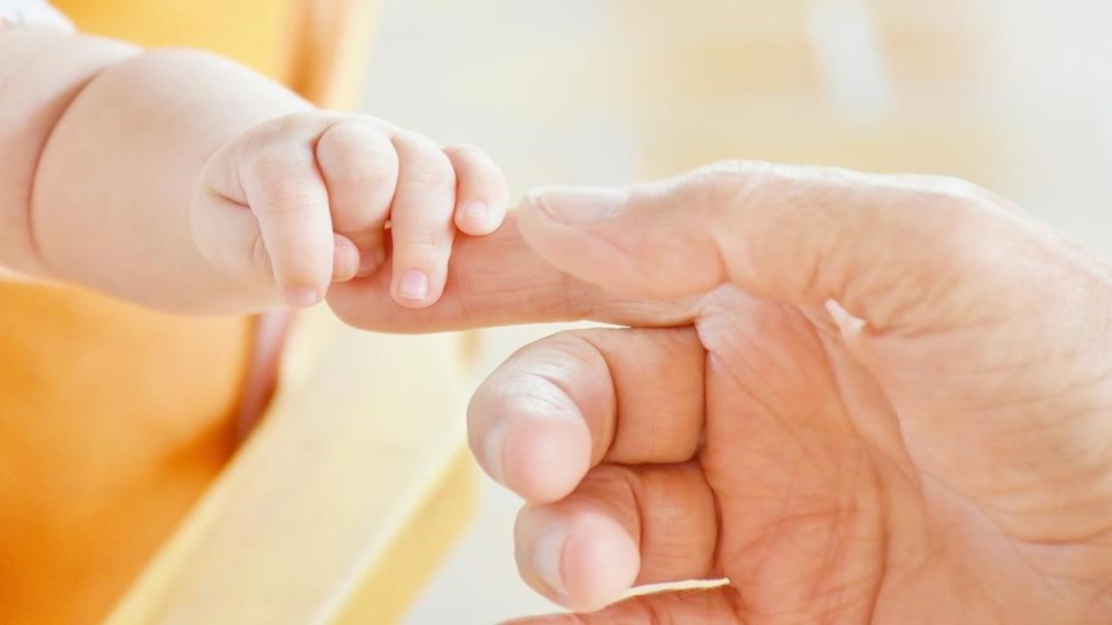 Stock photo of an infant's hand. (Courtesy of RitaE/Pixabay)