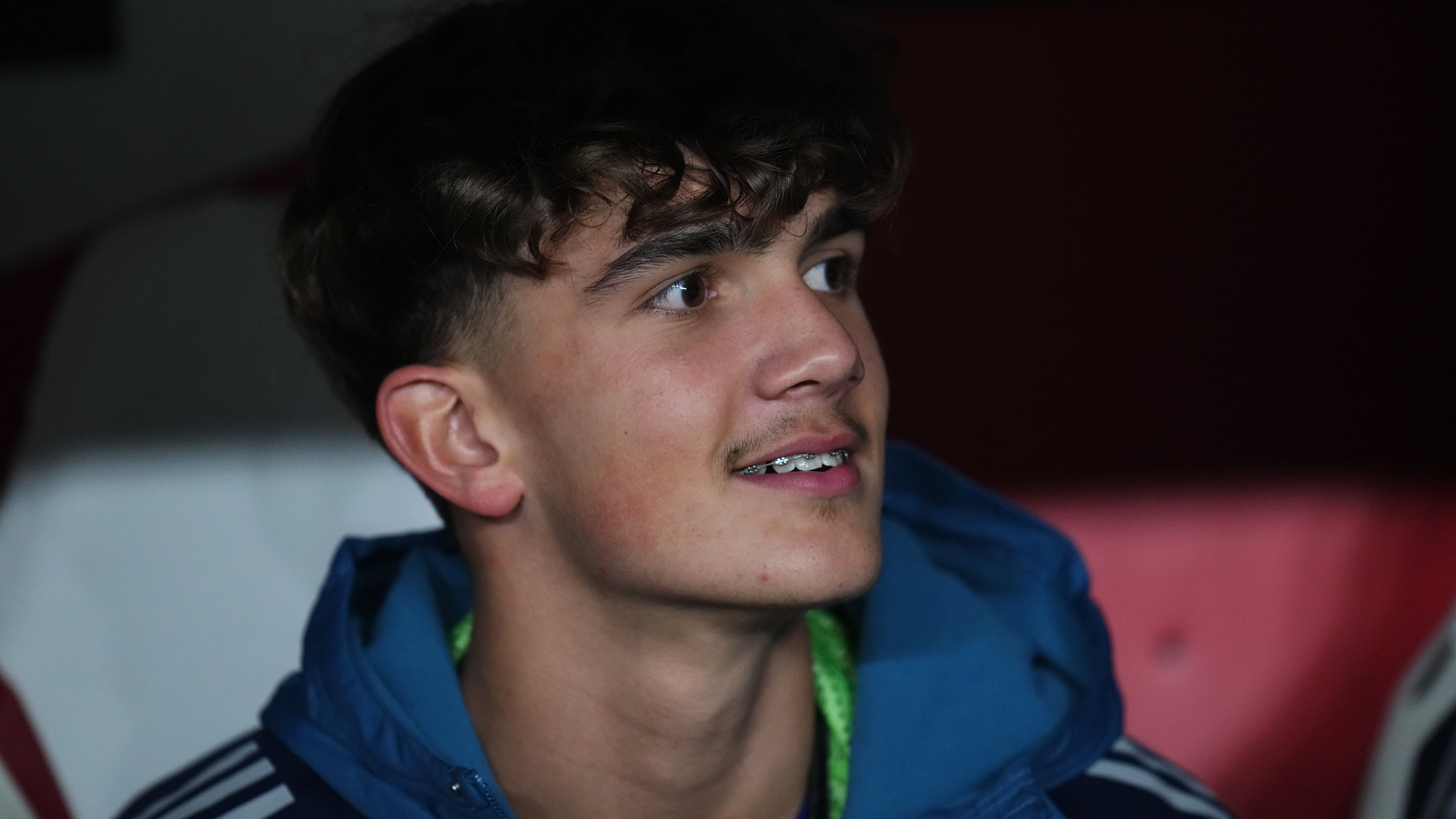 Arsenal's Max Dowman sits on the bench prior to the Champions League opening phase soccer match between Slavia Prague and Arsenal in Prague, Czech Republic, Tuesday, Nov. 4, 2025. (AP Photo/Petr David Josek)