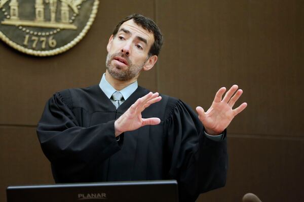 4/17/18 - Atlanta -  Fulton County Chief Judge Robert McBurney instructs the jury as final arguments were set to begin today during the Tex McIver murder trial at the Fulton County Courthouse.   Bob Andres bandres@ajc.com