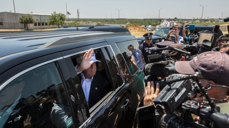 Donald Trump, the real estate mogul, waves while departing a news conference near the World Trade Bridge in Laredo, Texas, in July. Tamir Kalifa/The New York Times