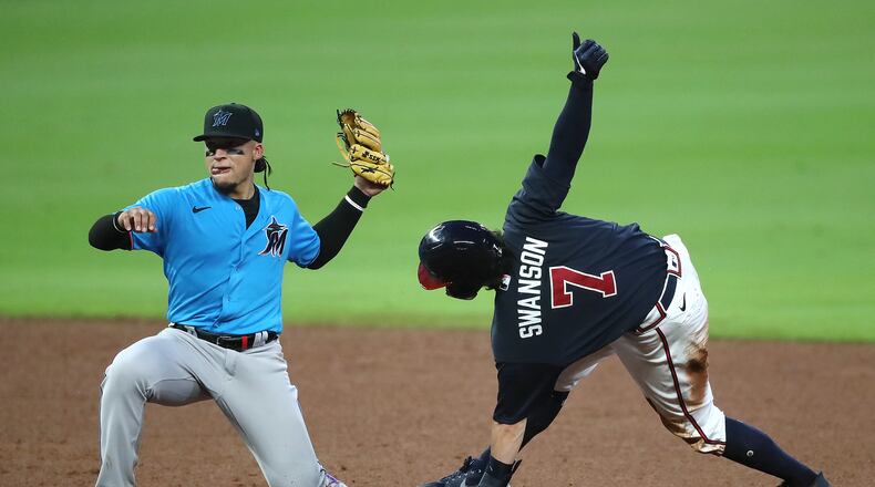 Braves shortstop Dansby Swanson is out stealing second by Miami Marlins second baseman Isan Diaz during the fifth inning in an exhibition game Tuesday, July 21, 2020, at Truit Park in Atlanta.