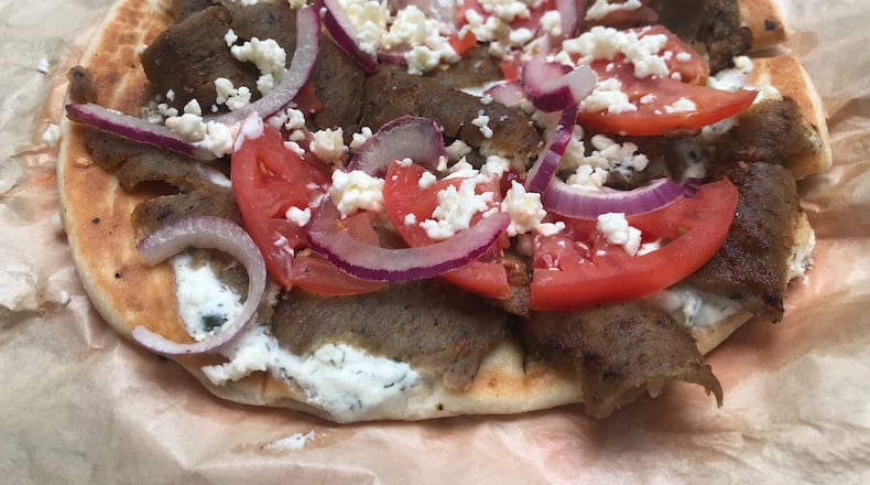 Yiayia’s Gyro Bites are among the appetizers on the menu at Athens Pizza. LIGAYA FIGUERAS / LIGAYA.FIGUERAS@AJC.COM