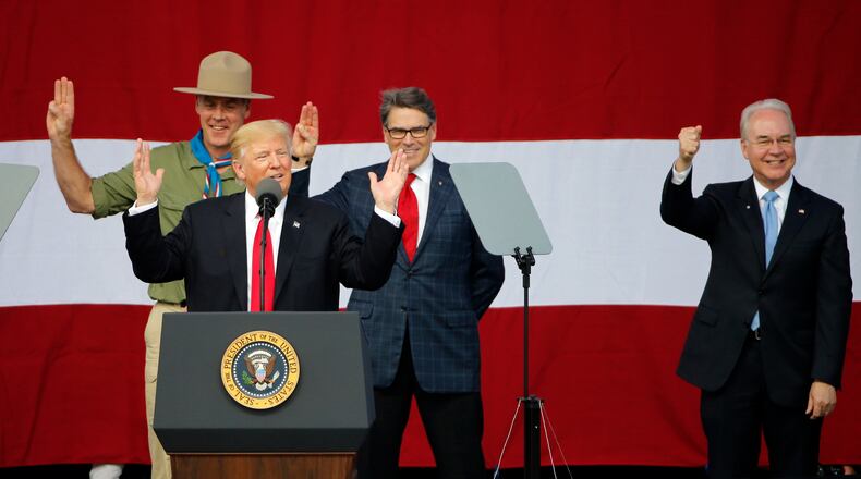 President Donald Trump, front left, with Secretary of Health and Human Services Tom Price, right, at the 2017 National Boy Scout Jamboree at the Summit in Glen Jean, W. Va., on Monday. AP/Steve Helber