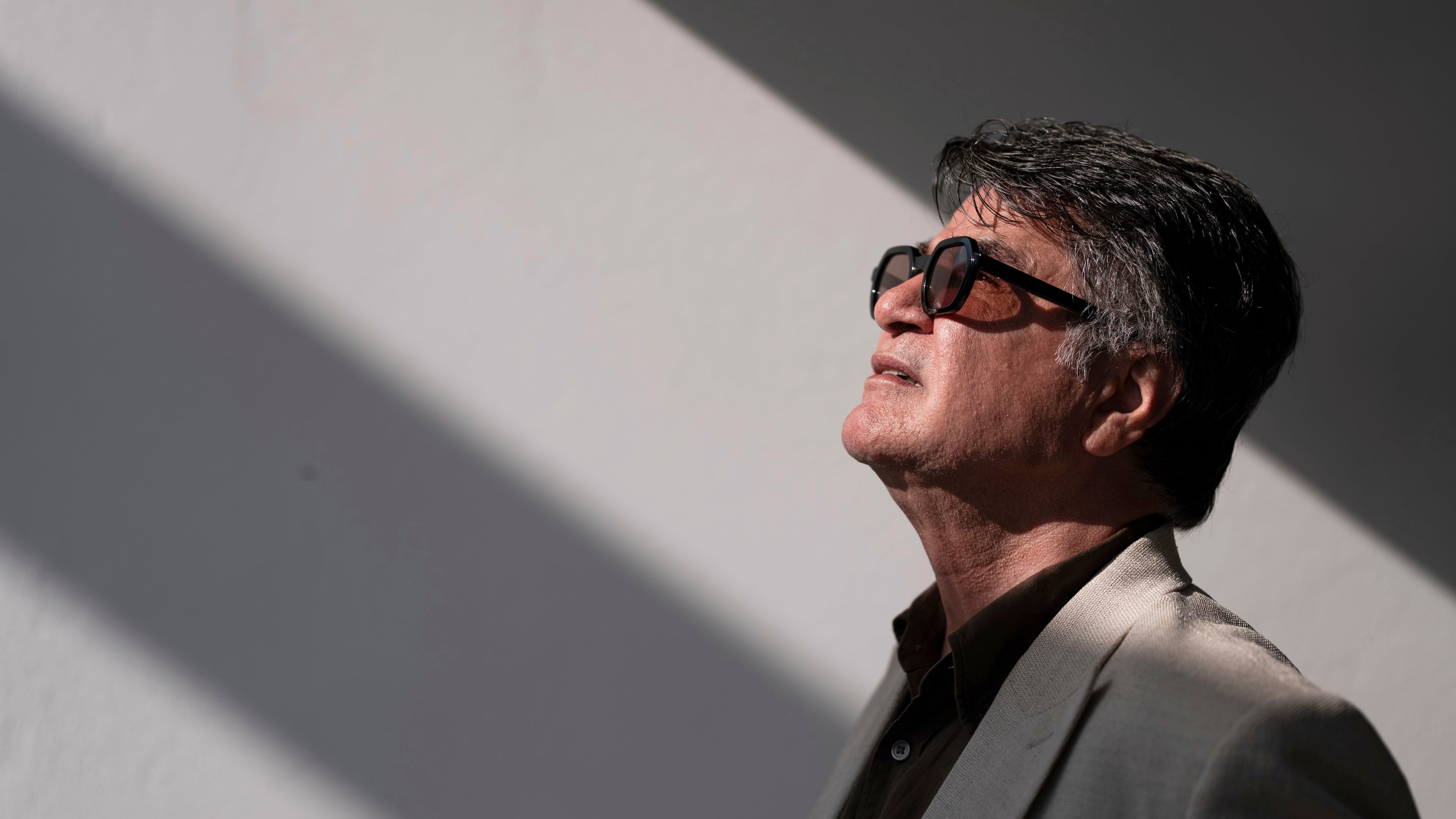 FILE - Director Jafar Panahi poses for a portrait photograph for the film "It Was Just an Accident" at the 78th international film festival, Cannes, southern France, on May 21, 2025. (Photo by Scott A Garfitt/Invision/AP, File)