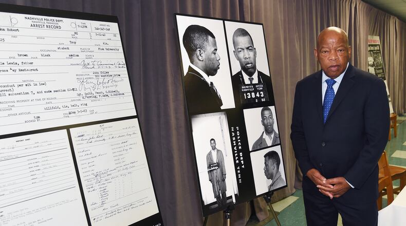 NASHVILLE, TN - NOVEMBER 19: Congressman/Civil Rights Icon John Lewis views for the first time images and his arrest record for leading a nonviolent sit-in at Nashville's segreated lunch counters, March 5, 1963. He was eariler honored with the Nashville Public Library Literary Award on November 19, 2016 in Nashville, Tennessee. (Photo by Rick Diamond/Getty Images)