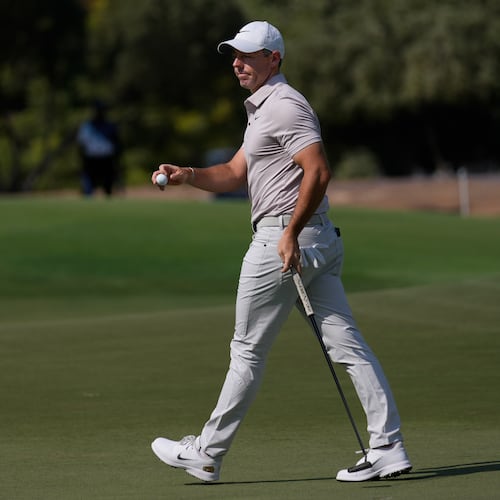 Rory McIlroy of Northern Ireland reacts after a birdie on the 1st hole during the third round of World Tour Golf Championship at Jumeirah Golf Estates, in Dubai, United Arab Emirates, Saturday, Nov. 15, 2025. (AP Photo/Altaf Qadri)