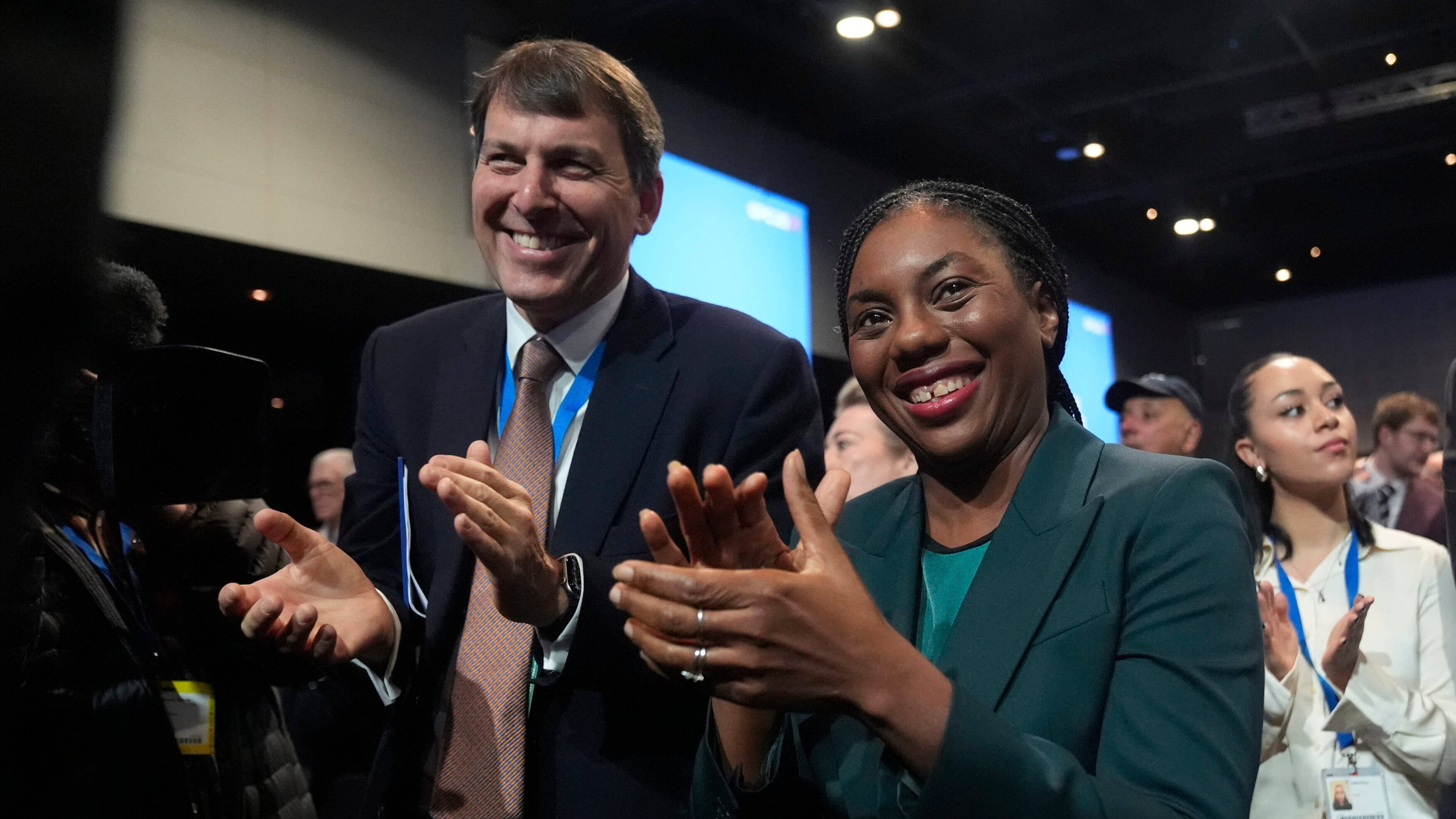 Party leader Kemi Bandenoch, front right, applauds after shadow chancellor Sir Mel Stride made his speech during the Conservative Party Conference in Manchester, England, Monday, Oct. 6, 2025. (Danny Lawson/PA via AP)