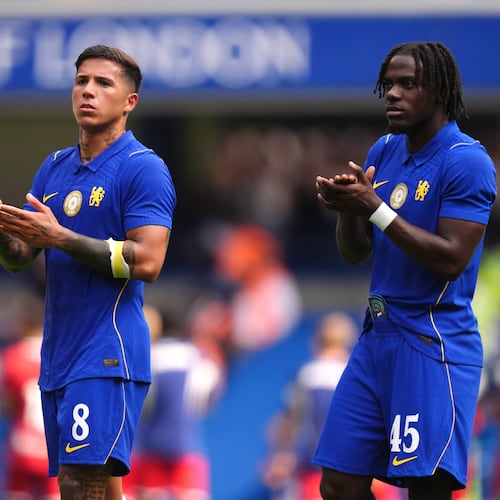 Chelsea's Enzo Fernandez, left, and Romeo Lavia applaud the fans after the final whistle in the pre-season friendly match between Real Sociedad and Chelsea at Stamford Bridge, London, on Saturday, Aug. 15, 2026. (John Walton/PA via AP)
