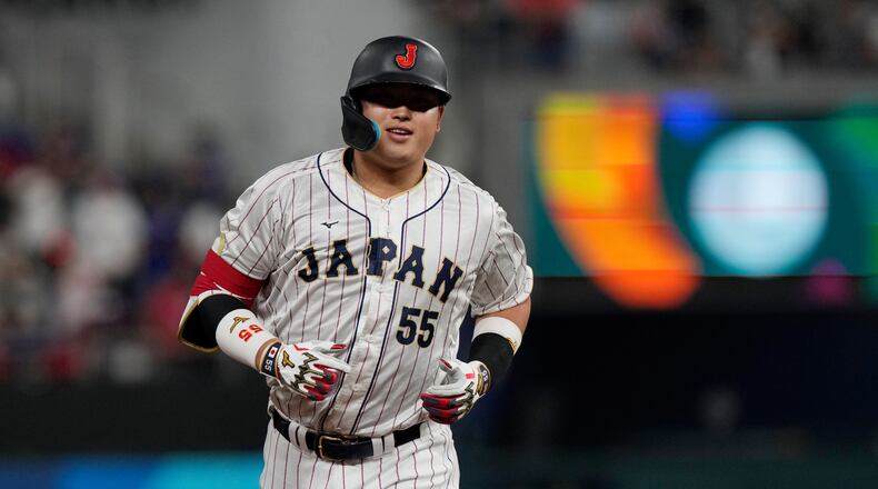 FILE - Japan's Munetaka Murakami rounds the bases after hitting a home run during the second inning of a World Baseball Classic game against the U.S., March 21, 2023, in Miami. (AP Photo/Marta Lavandier, file)