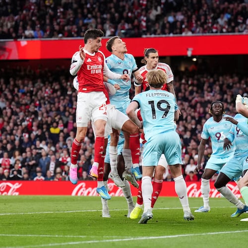 Arsenal's Kai Havertz, left, scores their side's first goal during the English Premier League soccer match between Arsenal and Burnley in London, Monday May 18, 2026. (John Walton/PA via AP)