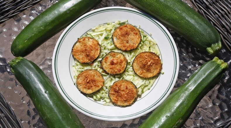 Zucchini Parmesan Crisps float on a bed of shredded zucchini on Wednesday, Aug. 23, 2017, in St. Louis. (J.B. Forbes/St. Louis Post-Dispatch/TNS)