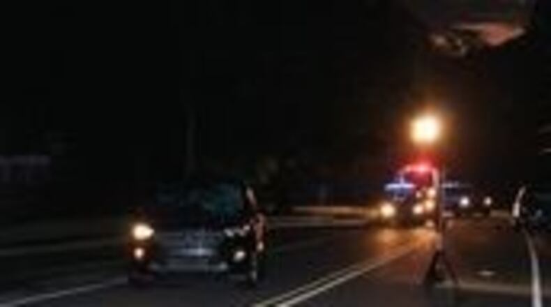 Investigators said the man darted into the road before he was struck by the Ford Escape.