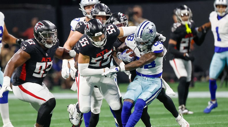 Atlanta Falcons linebacker Kaden Elliss (55) tackles Dallas Cowboys wide receiver CeeDee Lamb (88) during the first half of an NFL football game on Sunday, November 3, 2024, at Mercedes-Benz Stadium in Atlanta.
(Miguel Martinez/ AJC)