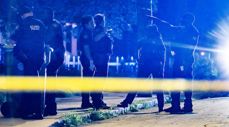 Police investigate the scene where a shooting in a northwest Atlanta neighborhood left one man dead on June 17, 2024 according to police. (John Spink/AJC)