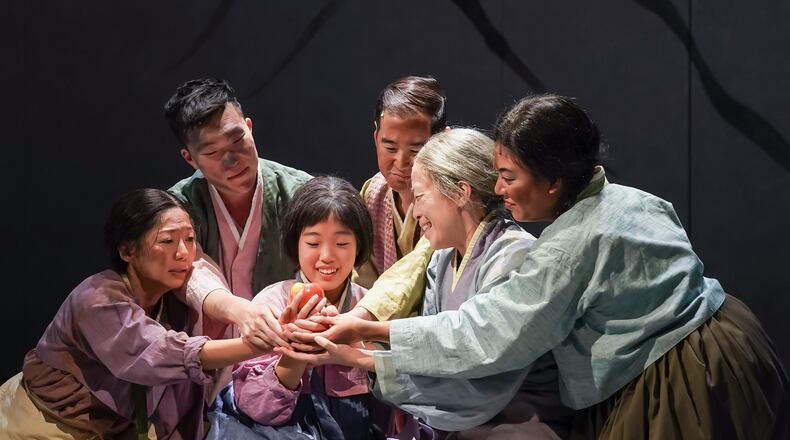 "Bina’s Six Apples," a drama in which one little girl searches for her family during the Korean War, has arrived on the Alliance Theatre’s stage as the Russia-Ukraine war commands the world stage. (Photos by Glen Stubbe)