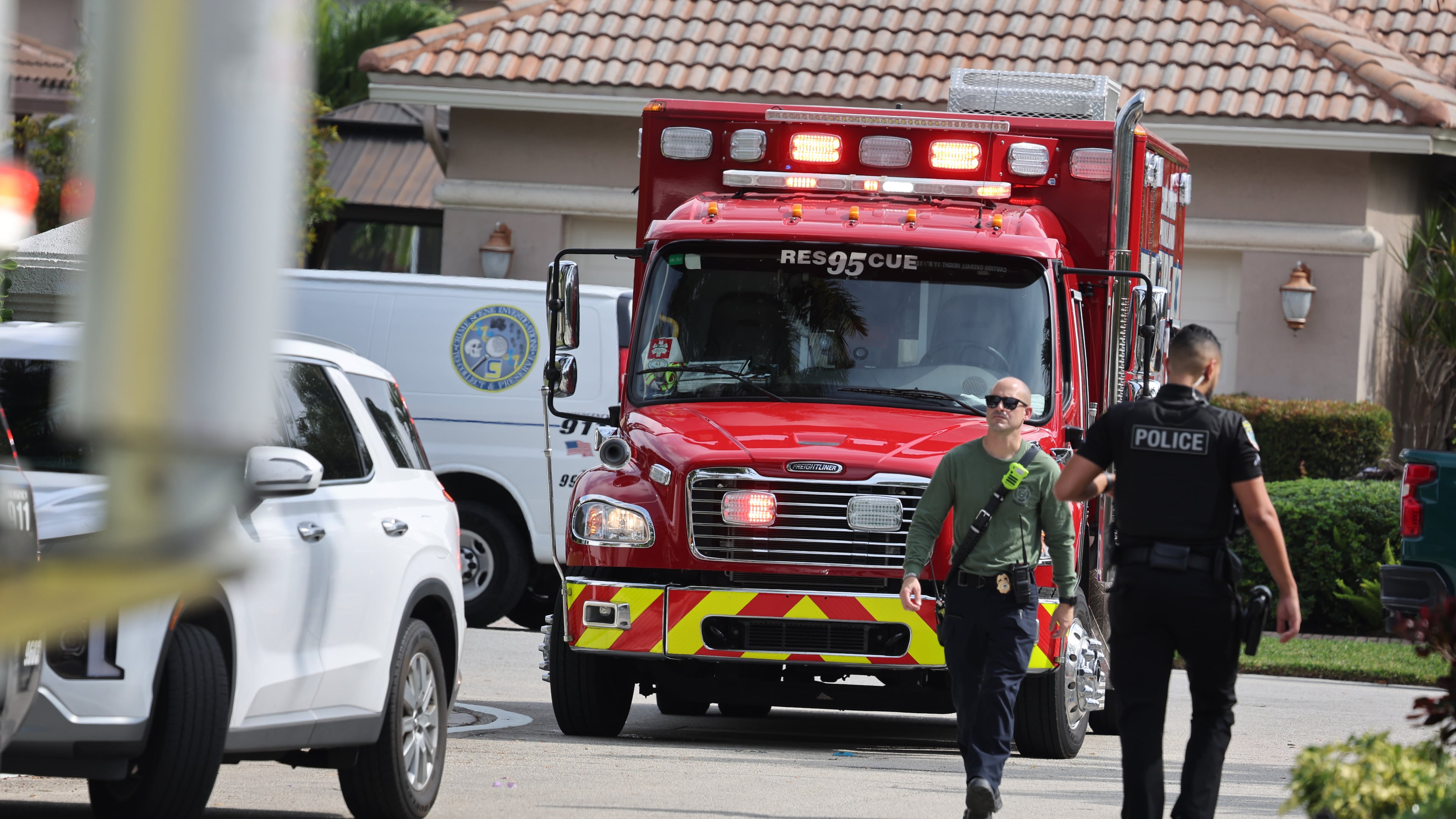 Emergency personnel from Coral Springs and Coconut Creek are on scene where a plane crashed in the Windsor Bay community in Coral Springs on Monday, Nov. 10, 2025. (Carline Jean/South Florida Sun-Sentinel via AP)