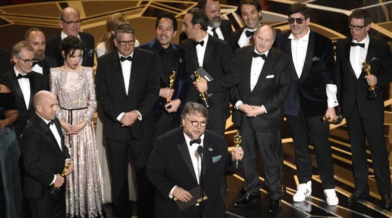Guillermo del Toro and the cast and crew of "The Shape of Water" accept the award for best picture at the Oscars on Sunday, March 4, 2018, at the Dolby Theatre in Los Angeles. Photo by Chris Pizzello/Invision/AP