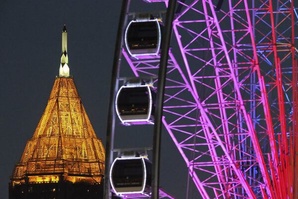 See the skyline from about 20 stories above Centennial Park when you take a ride on the SkyView Ferris wheel. JOHN SPINK / JSPINK@AJC.COM