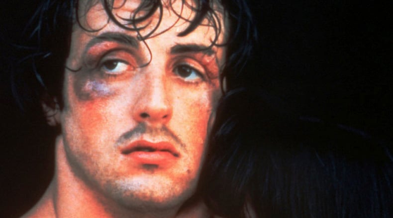 Actor and screenwriter Sylvester Stallone holds actress Talia Shire in a scene from the 1976 movie “Rocky.” (AP Photo, File)