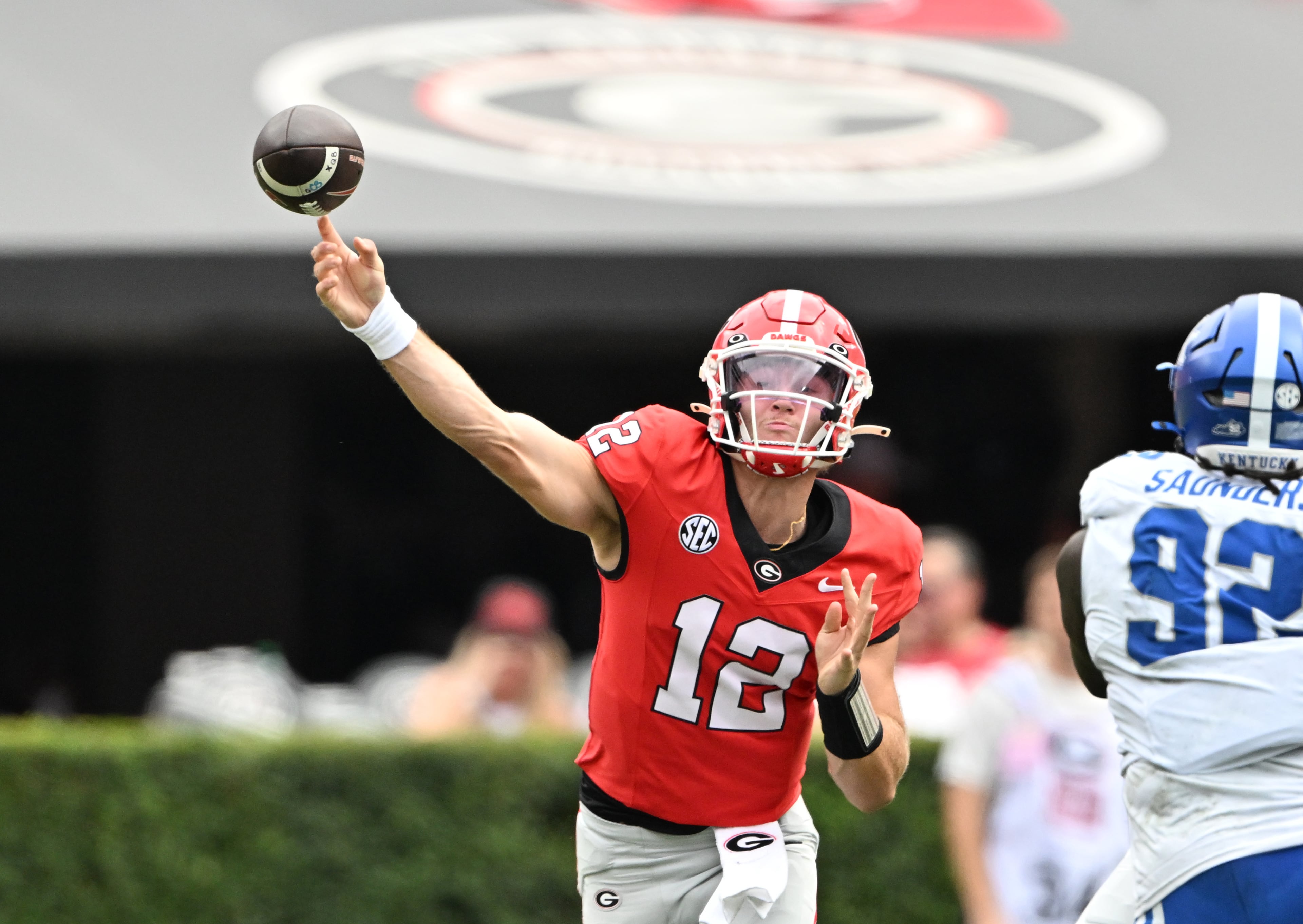 Georgia quarterback Ryan Puglisi (12) throws a pass during the second half in a NCAA college football game at Sanford Stadium, Saturday, October 4, 2025, in Athens. Georgia won 35 -14 over Kentucky. (Hyosub Shin / AJC)