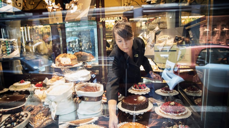 Pastries in a window facing the street at Cova Caffe, owned by LVMH Moet Hennessy Louis Vuitton, in Milan, Italy, Sept. 23, 2015. Food, or at least pastry, seems to have become the latest weapon in the luxury wars. (Andrea Frazzetta/The New York Times)
