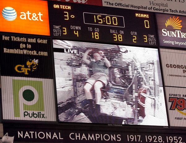 Georgia Tech graduate Eric Boe from the Space Shuttle is shown on the jumbotron during a 2008 Tech football game.