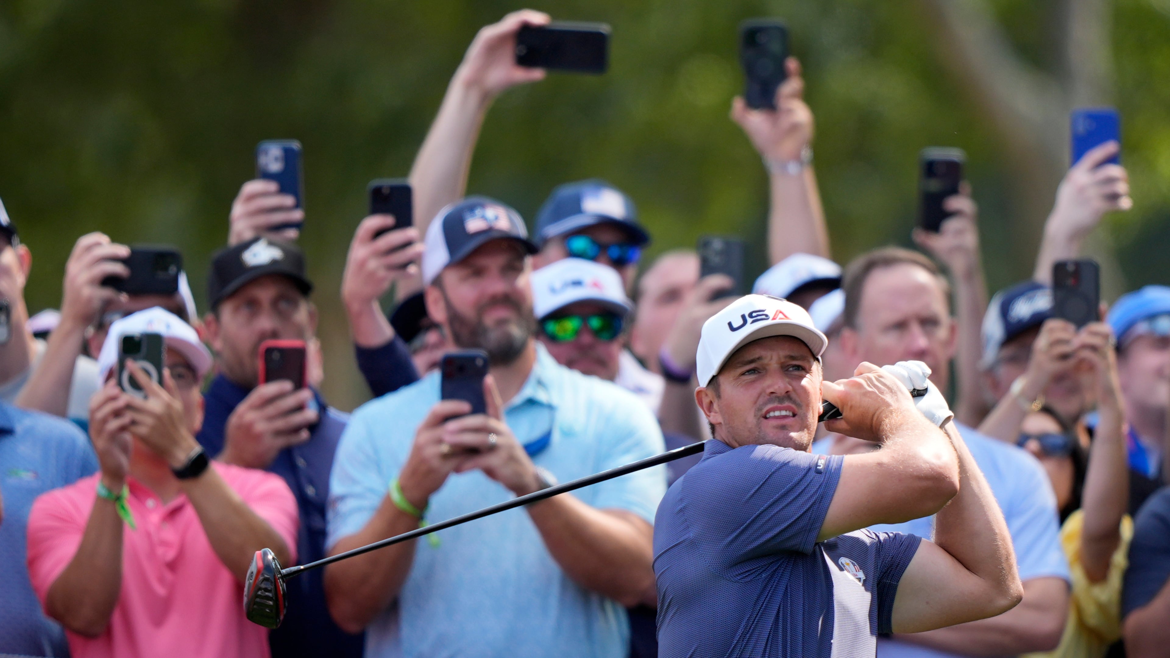 United States' Bryson DeChambeau watches his tee shot on the 12th hole during a practice round for the Ryder Cup golf tournament, Tuesday, Sept. 23, 2025, in Farmingdale, N.Y., at Bethpage State Park's Black Course. (AP Photo/Robert Bukaty)