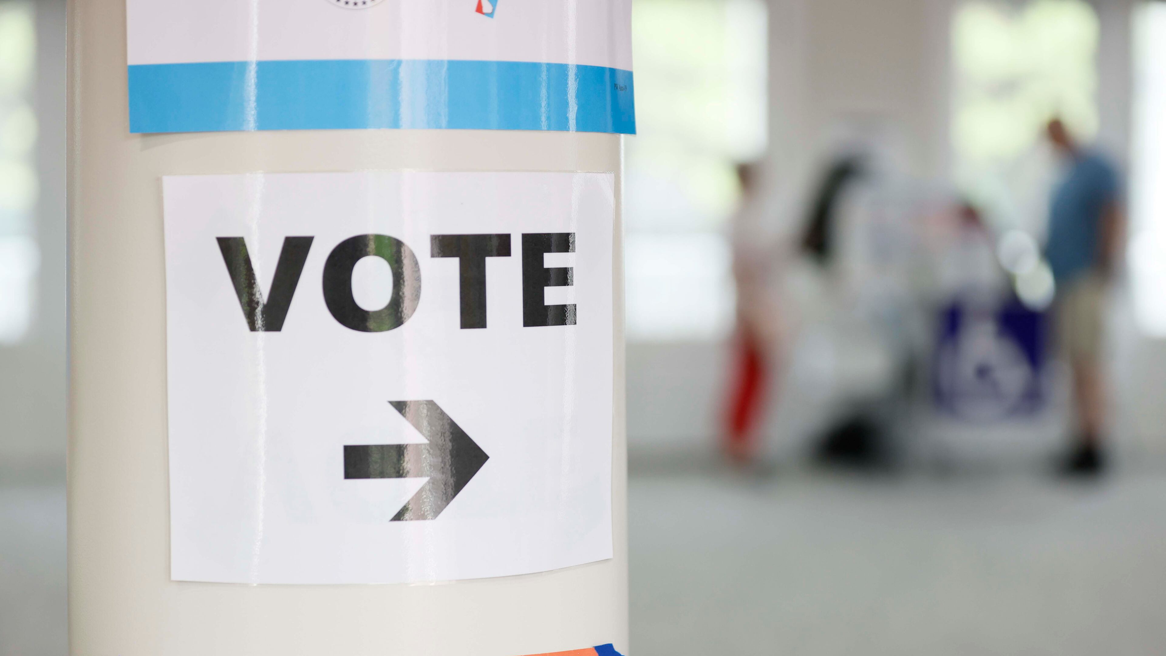 A vote sign helps voters find the voting machines at the River-Green subdivision in Canton during the special election for the state senate seat in Cherokee on Tuesday, August 26, 2025 to complete former state Sen. Brandon Beach’s term, which runs through January 2027. (Miguel Martinez/ AJC)
