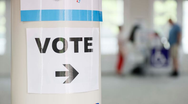 A vote sign helps voters find the voting machines at the River-Green subdivision in Canton during the special election for the state senate seat in Cherokee on Tuesday, August 26, 2025 to complete former state Sen. Brandon Beach’s term, which runs through January 2027. (Miguel Martinez/ AJC)