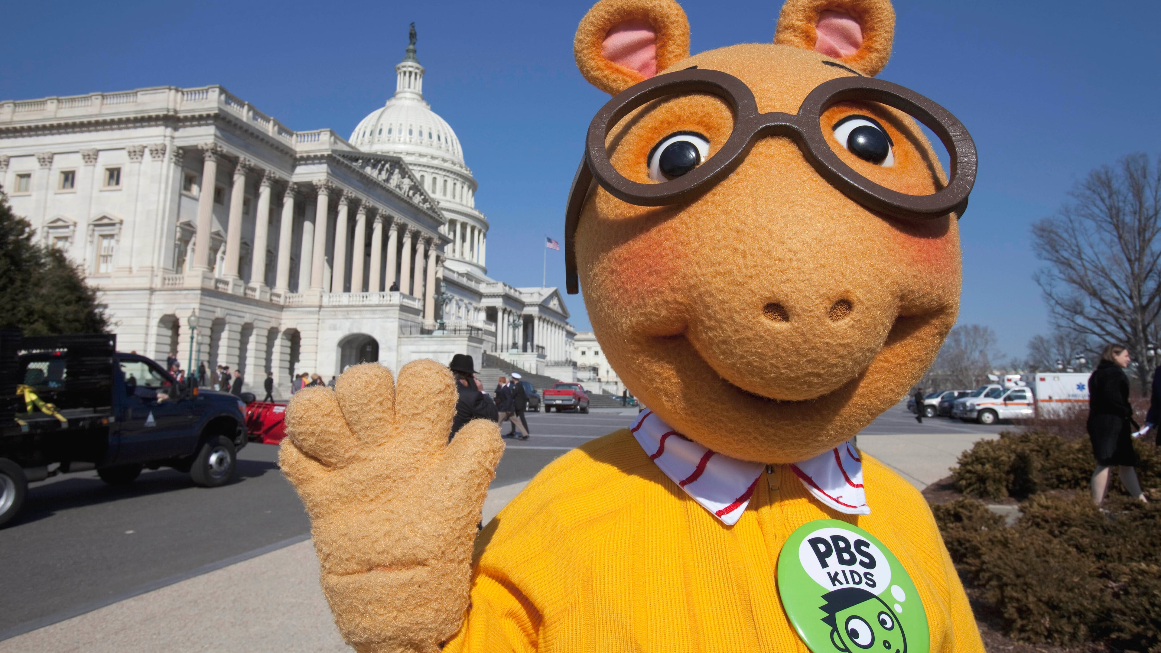 FILE - Arthur the Aardvark waves on Capitol Hill in Washington, Feb. 16, 2011, during a news conference to discuss the future of public broadcasting. (AP Photo/Harry Hamburg, File)