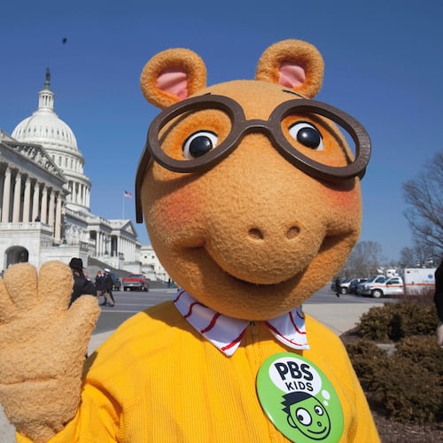 FILE - Arthur the Aardvark waves on Capitol Hill in Washington, Feb. 16, 2011, during a news conference to discuss the future of public broadcasting. (AP Photo/Harry Hamburg, File)