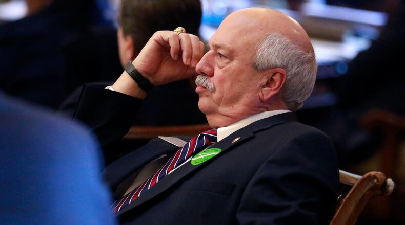 Jan. 28, 2016 - Atlanta - Rep. Tommy Benton, R - Jefferson, watches proceedings from his desk on the floor of the House. BOB ANDRES / BANDRES@AJC.COM
