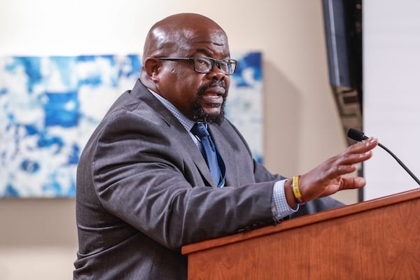 Lee Reid, executive director of the Atlanta Citizen Review Board, discusses steps being taken to investigate police use of deadly force to the public safety committee at Atlanta City Hall on Monday, April 28, 2025. (Natrice Miller/AJC)