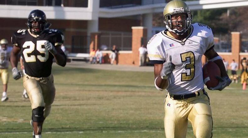 Georgia Tech's Will Glover (3) races for a 65-yard touchdown as Wake Forest's Ed Kargbo-Okorogie (25) pursues in the second quarter of Georgia Tech's 38-33 win at Groves Stadium in Winston-Salem, N.C., Saturday, Nov. 17, 2001. (AP Photo/Chuck Burton)