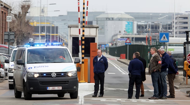 BRUSSELS, BELGIUM - MARCH 22: Police vehicles leave Zaventem Bruxelles International Airport after a terrorist attack on March 22, 2016 in Brussels, Belgium. At least 34 people are thought to have been killed after Brussels airport and a Metro station were targeted by explosions. The attacks come just days after a key suspect in the Paris attacks, Salah Abdeslam, was captured in Brussels(Photo by Sylvain Lefevre/Getty Images)