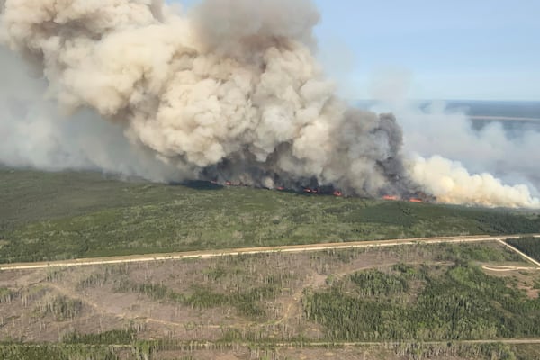 This photo provided by the Manitoba government shows wildfires in Wanless, Manitoba, Canada, on Tuesday, May 27, 2025. (Manitoba government via AP)